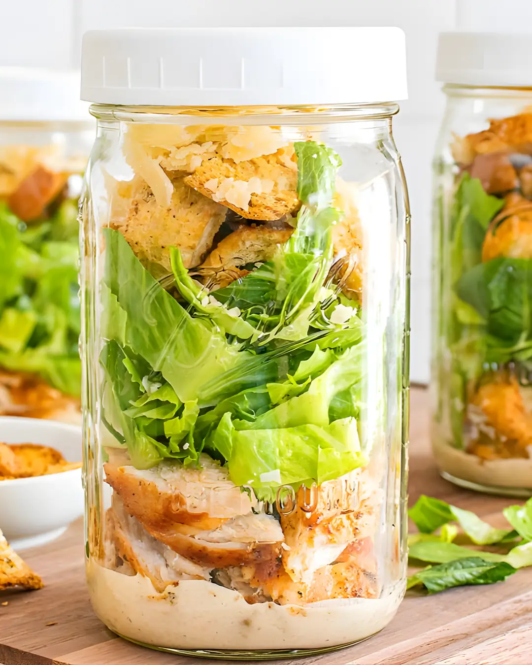 Grilled Chicken Caesar jar salad with lid
